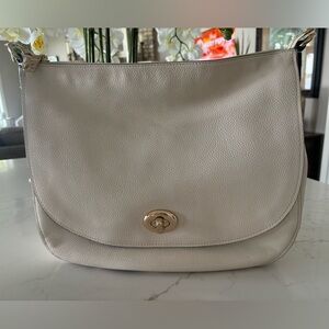 Beautiful large ivory coach shoulder bag.